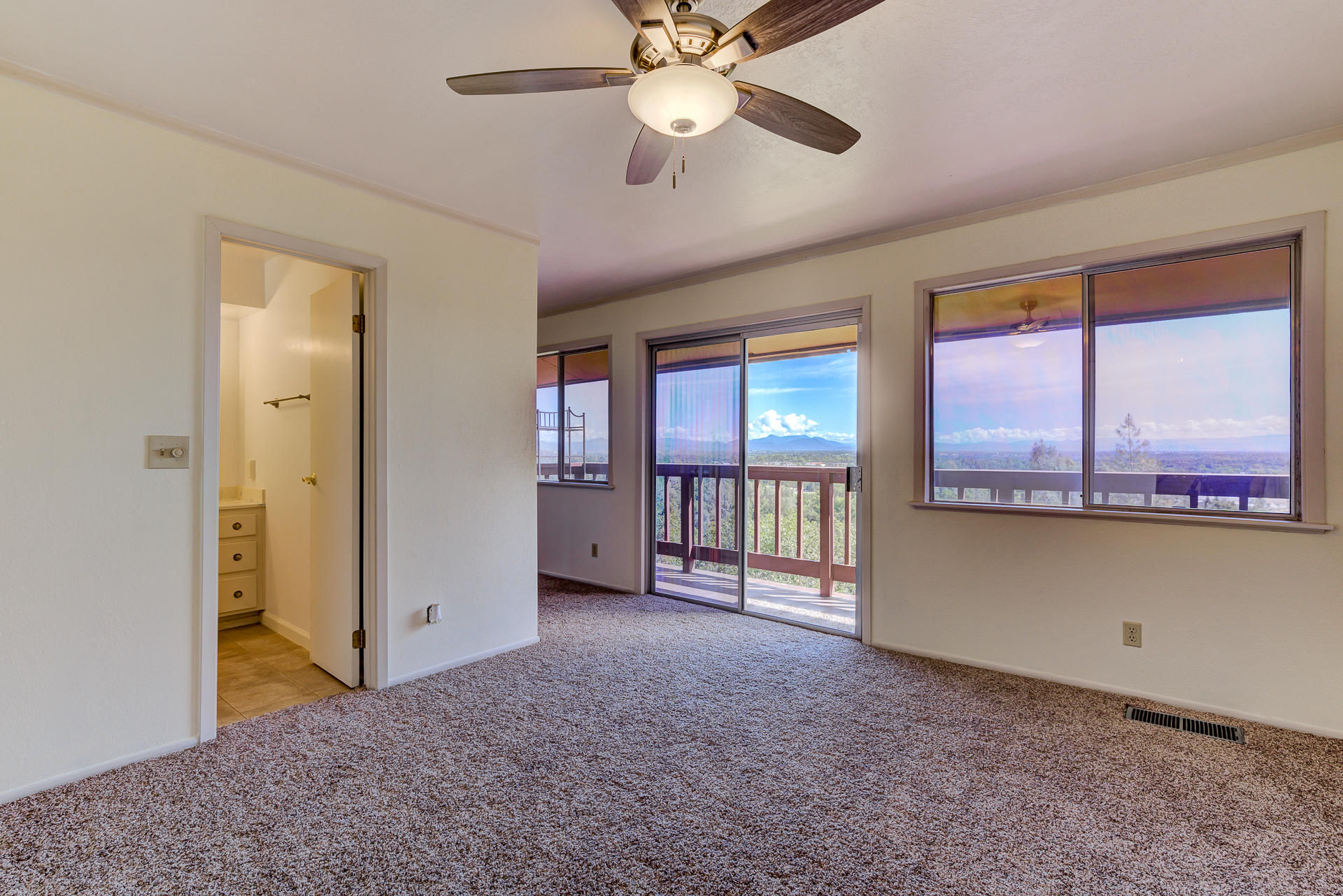 8809 Valley View Road Redding, CA 96001 - Photo 15 of 31 a view of an empty room with a window