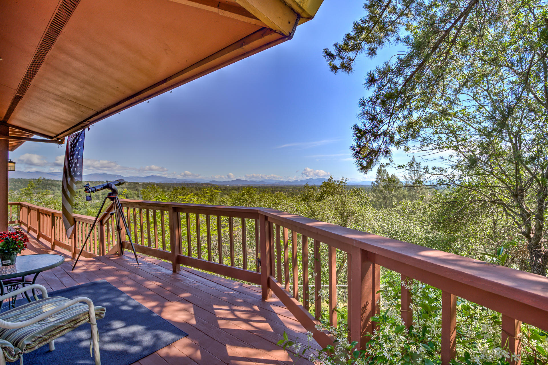 8809 Valley View Road Redding, CA 96001 - Photo 8 of 31 a view of balcony with wooden floor and fence