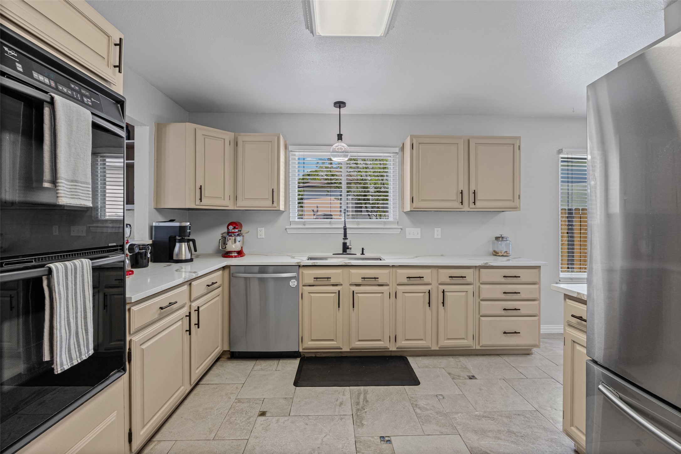 3011 Wadsworth Way Austin, TX 78748 - Photo 18 of 35 Culinary creations come to life in this naturally illuminated kitchen.