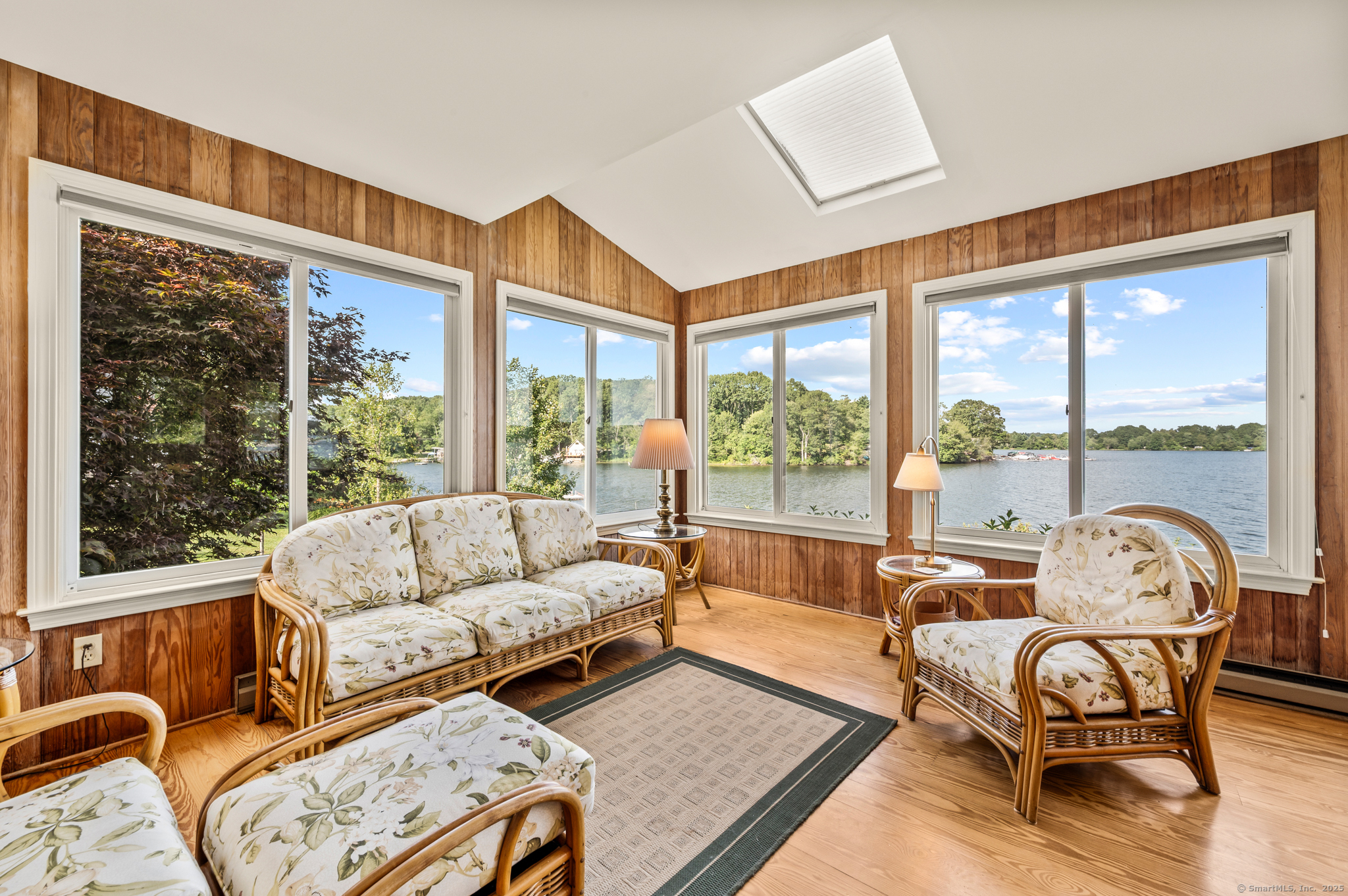 424 Bantam Lake Road Morris, CT 06763 - Photo 11 of 34 a living room with furniture and a large window