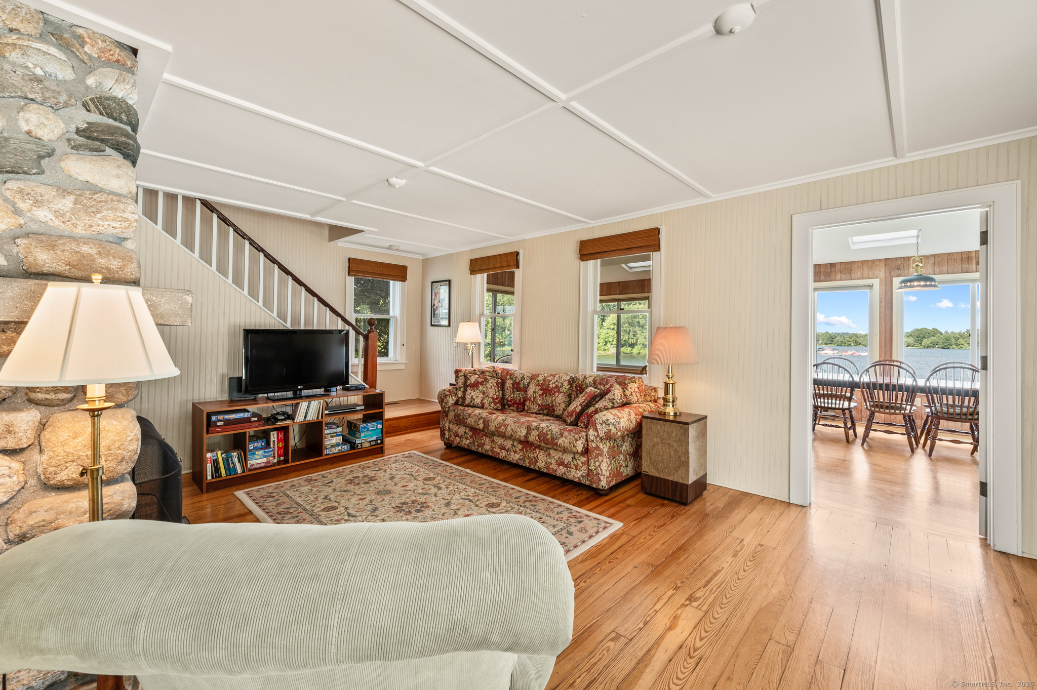 424 Bantam Lake Road Morris, CT 06763 - Photo 13 of 34 a living room with fireplace furniture and a flat screen tv