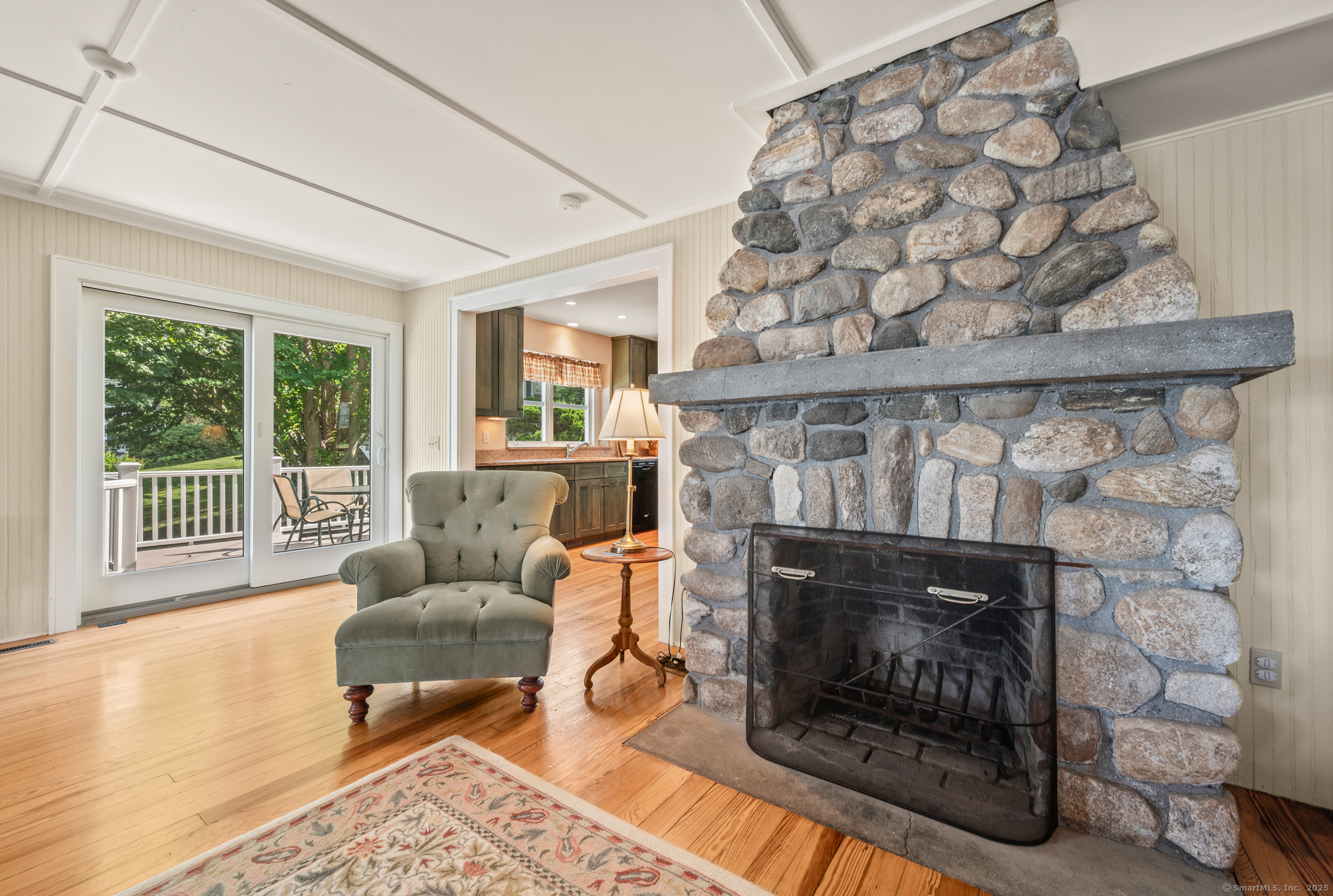424 Bantam Lake Road Morris, CT 06763 - Photo 14 of 34 a living room with furniture and a fireplace