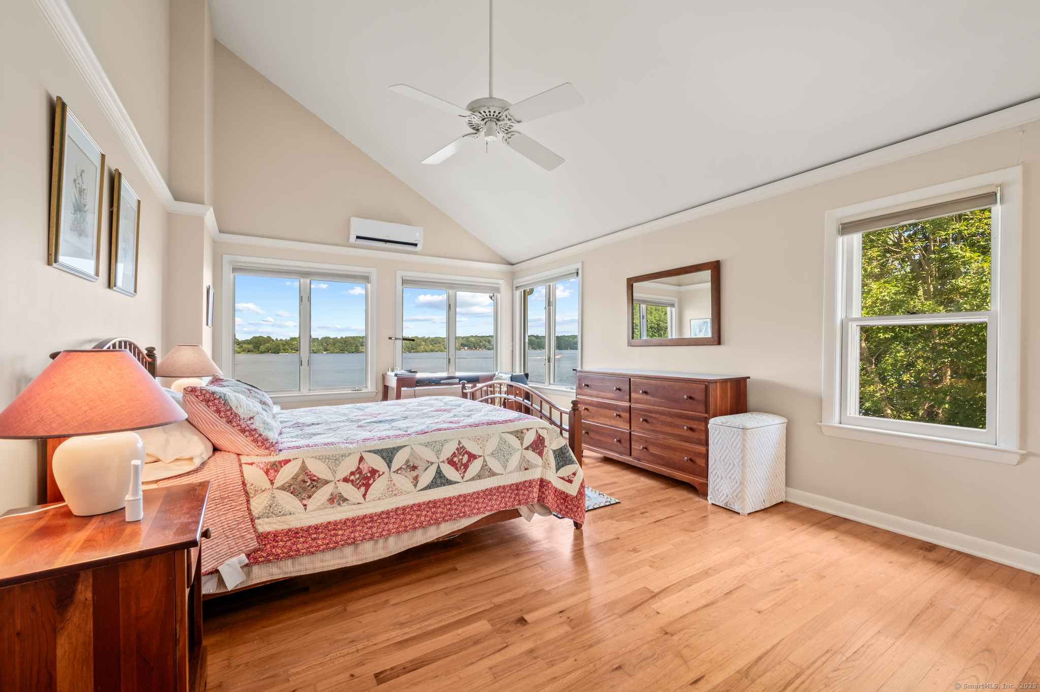 424 Bantam Lake Road Morris, CT 06763 - Photo 25 of 34 a spacious bedroom with a bed and wooden floor