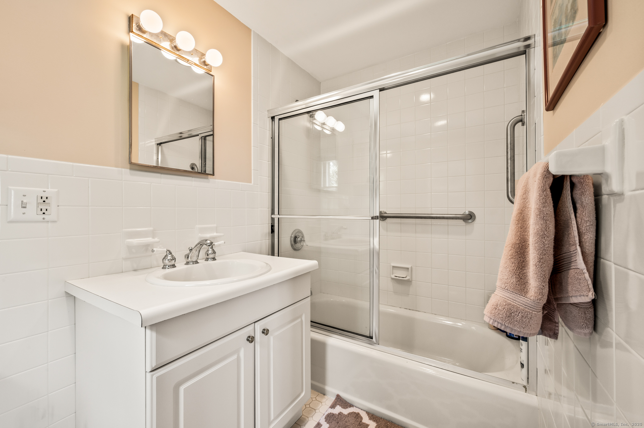 424 Bantam Lake Road Morris, CT 06763 - Photo 27 of 34 a bathroom with a sink bath tub and a shower
