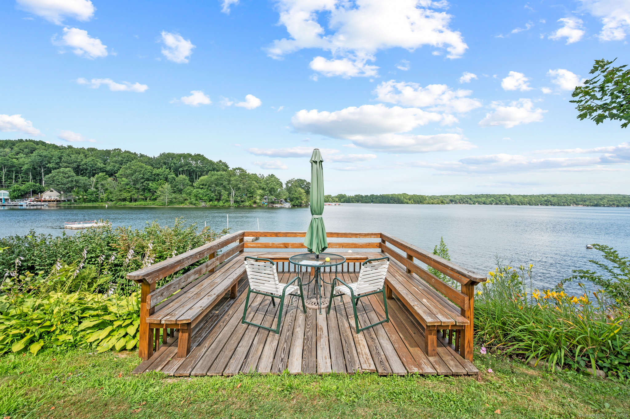 424 Bantam Lake Road Morris, CT 06763 - Photo 29 of 34 a view of house with yard and lake view