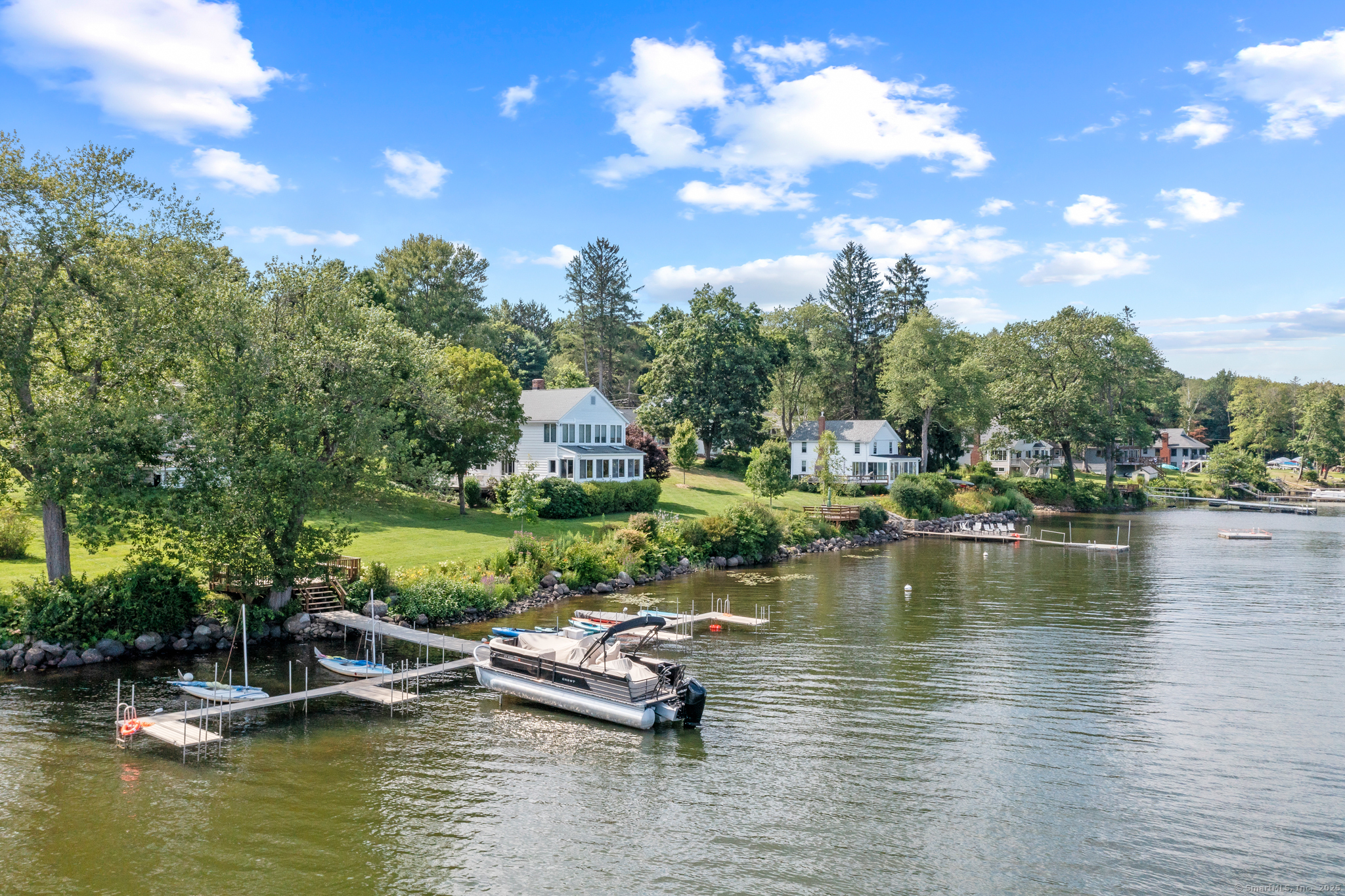 424 Bantam Lake Road Morris, CT 06763 - Photo 5 of 34 a view of a lake with houses