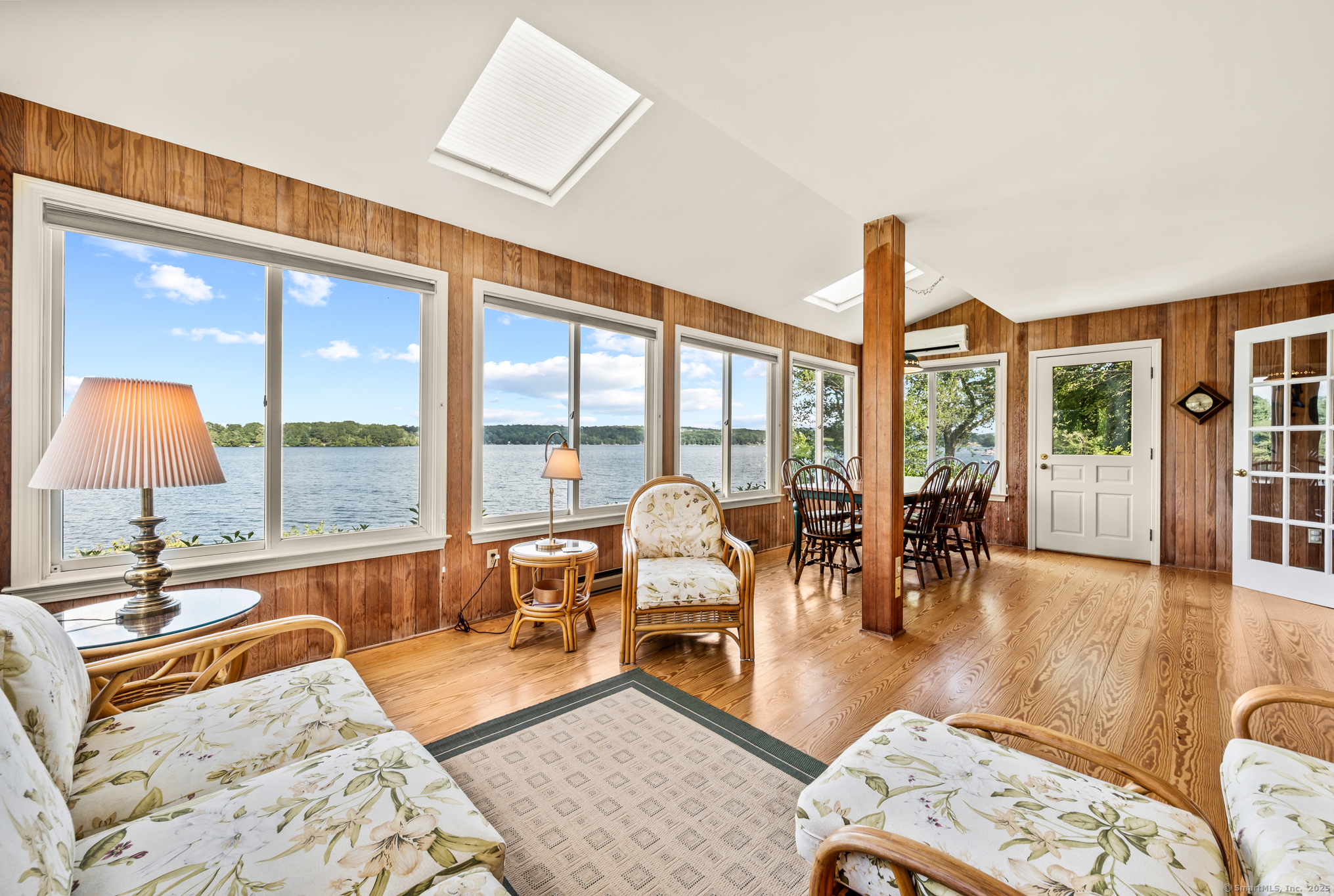 424 Bantam Lake Road Morris, CT 06763 - Photo 10 of 34 a living room with furniture and large windows