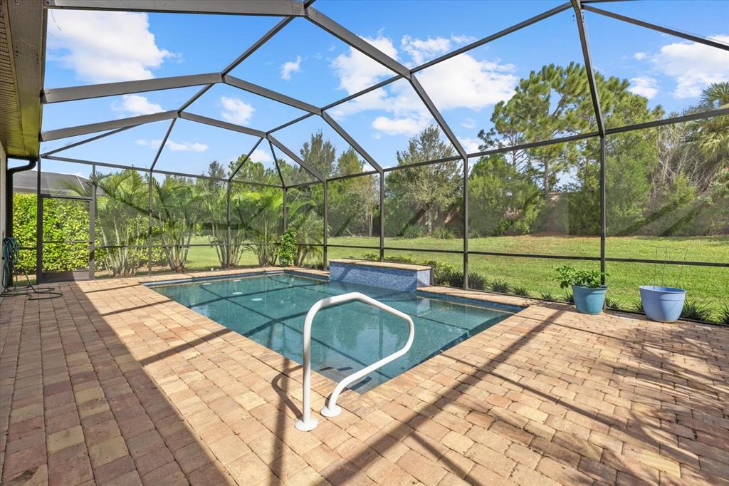 6835 Chester Trail Bradenton, FL 34202 - Photo 30 of 40 a view of a backyard with a swimming pool