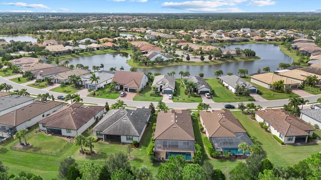 6835 Chester Trail Bradenton, FL 34202 - Photo 39 of 40 an aerial view of residential houses with outdoor space and river