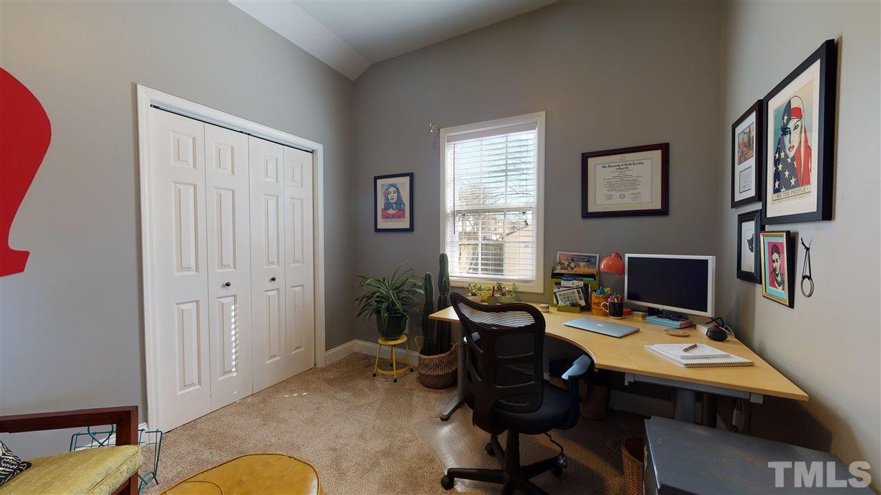 910 East Jones Street Raleigh, NC 27601 - Photo 17 of 23 a workspace with furniture and window