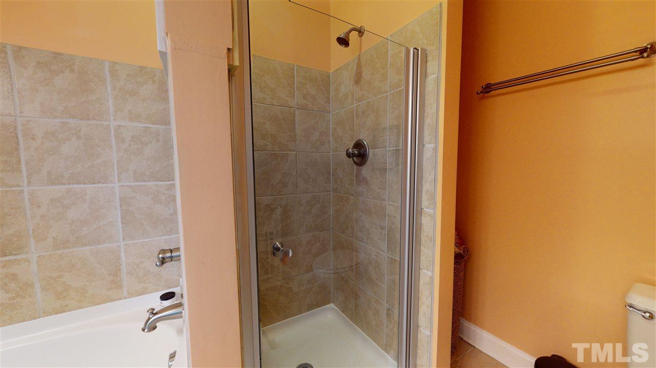 910 East Jones Street Raleigh, NC 27601 - Photo 20 of 23 a bathroom with a shower