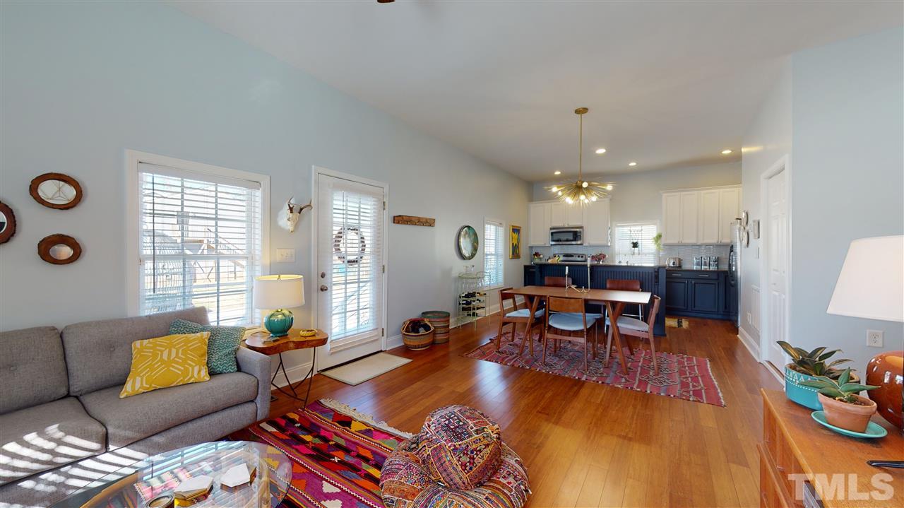 910 East Jones Street Raleigh, NC 27601 - Photo 8 of 23 a living room with furniture and a large window