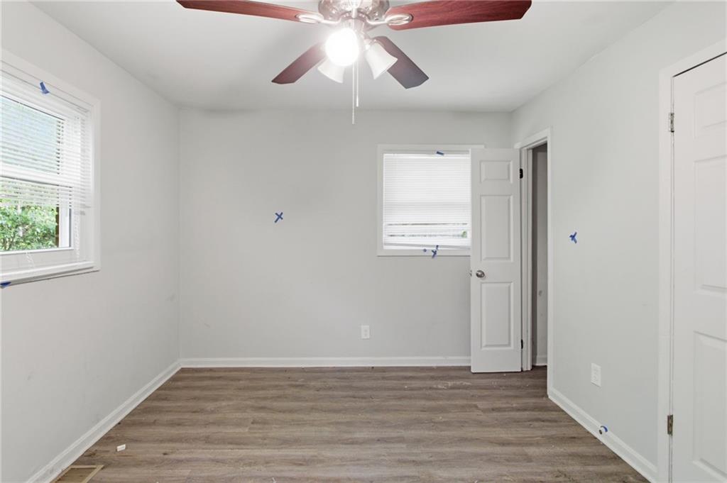 192 Highway 138 Stockbridge, GA 30281 - Photo 16 of 23 a view of an empty room with wooden floor and a window