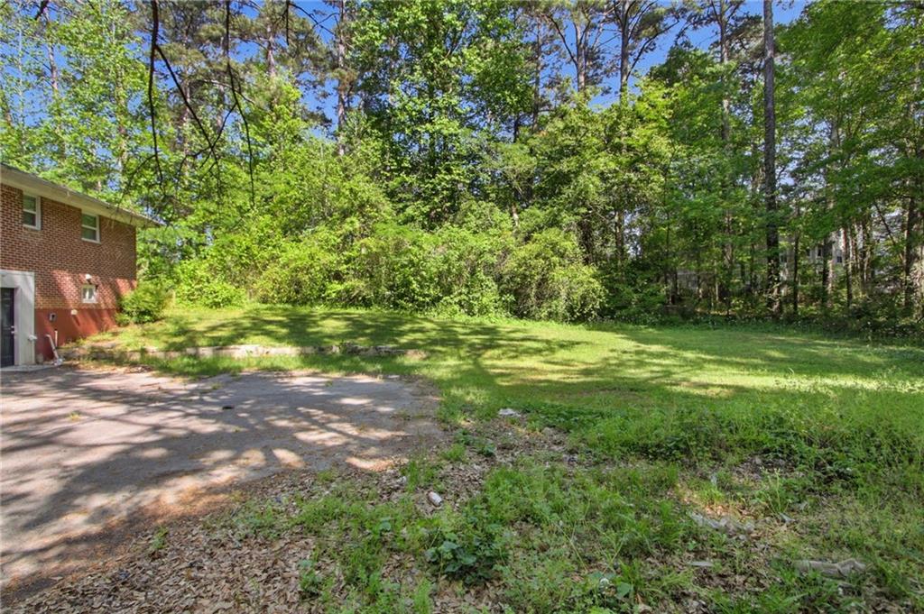 192 Highway 138 Stockbridge, GA 30281 - Photo 20 of 23 a view of a yard with a tree