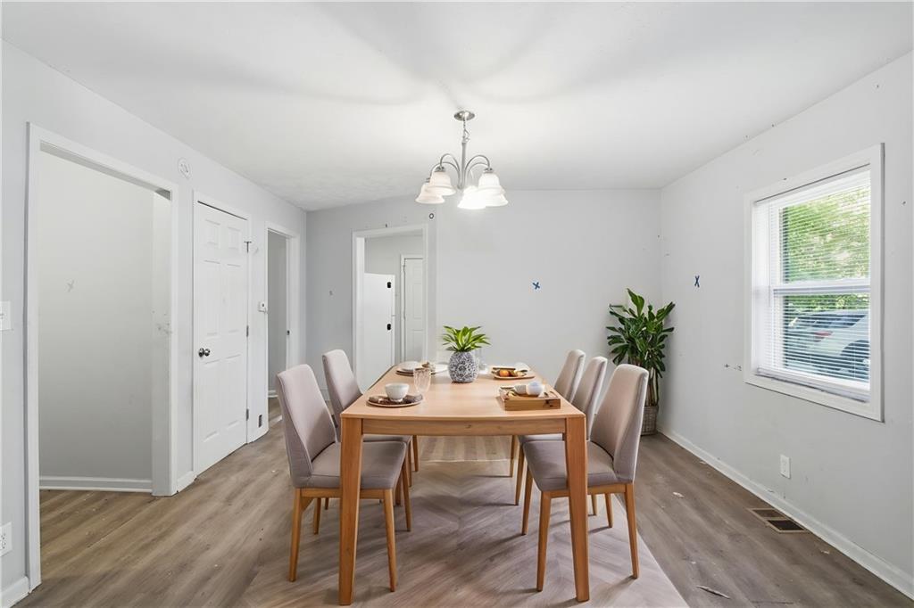 192 Highway 138 Stockbridge, GA 30281 - Photo 3 of 23 a view of a dining room with furniture window and wooden floor