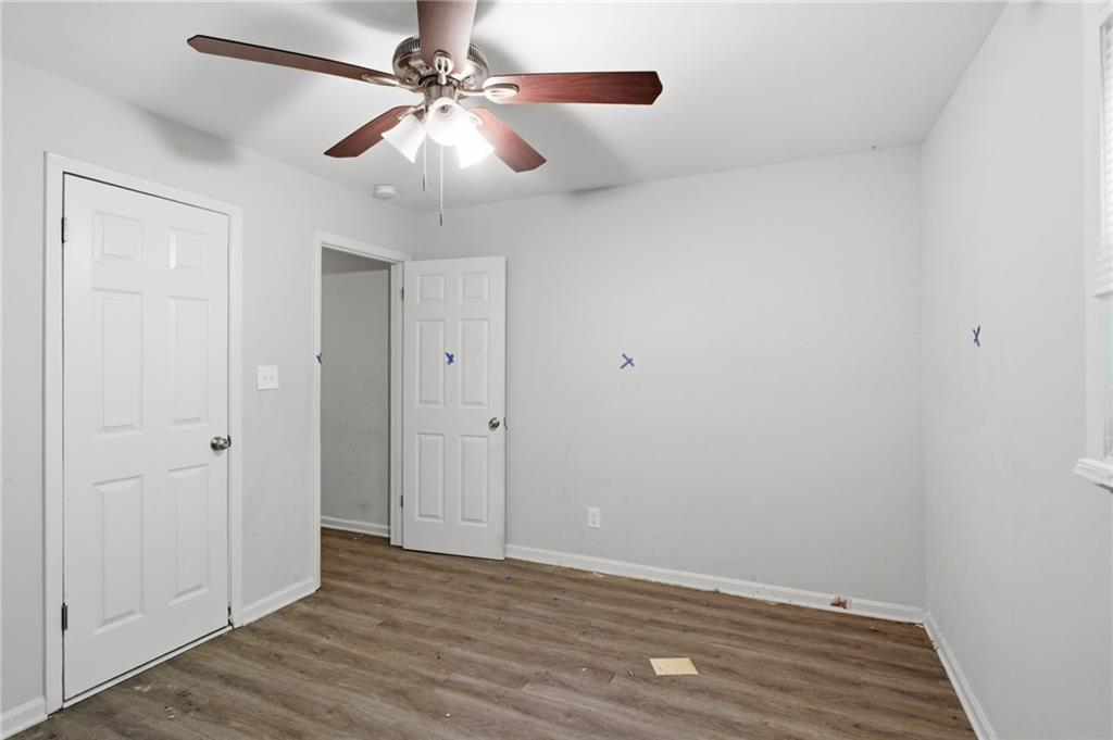 192 Highway 138 Stockbridge, GA 30281 - Photo 7 of 23 wooden floor in an empty room