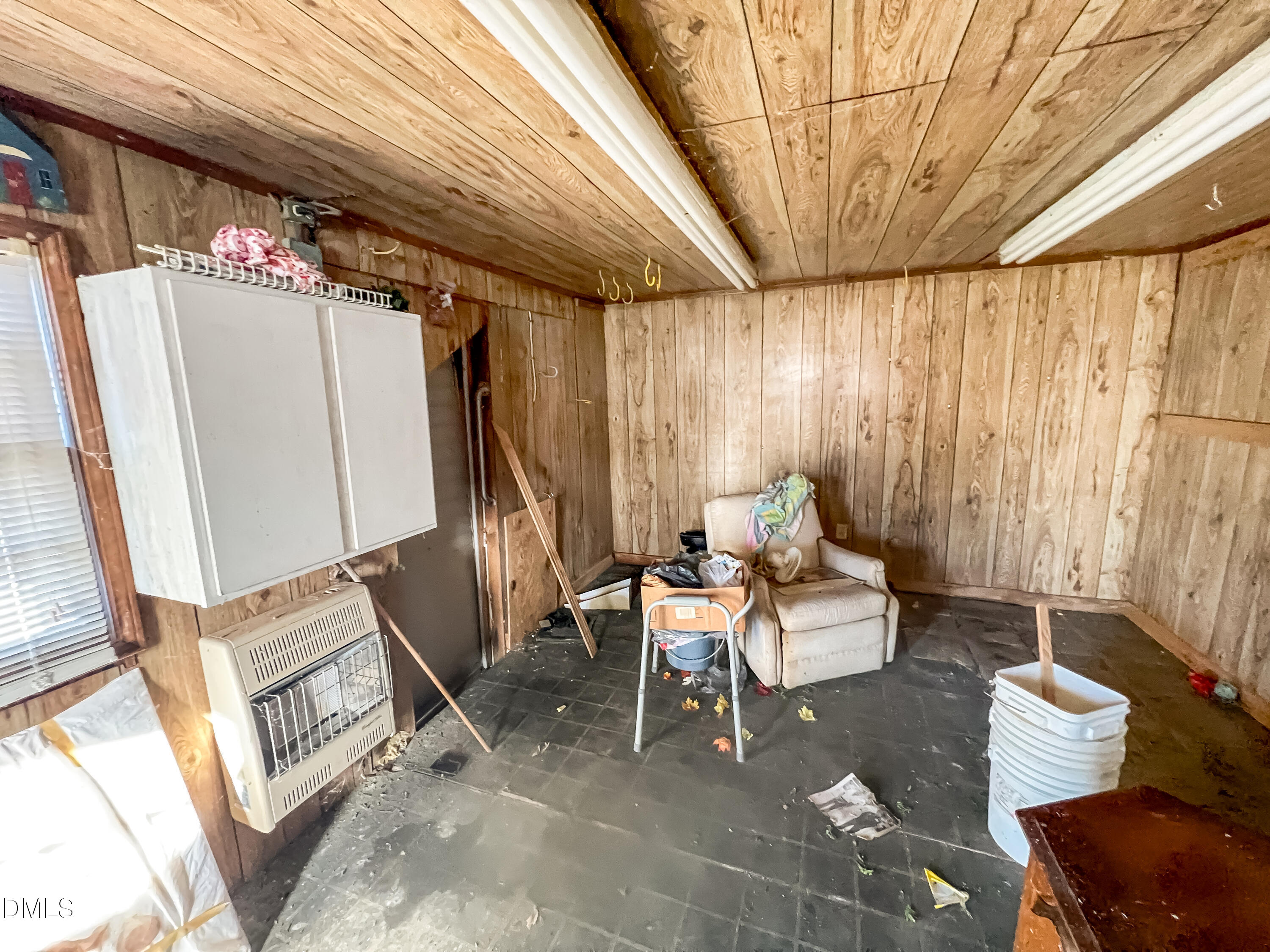 66 Allensville Road Roxboro, NC 27573 - Photo 44 of 52 a living room with furniture and a window