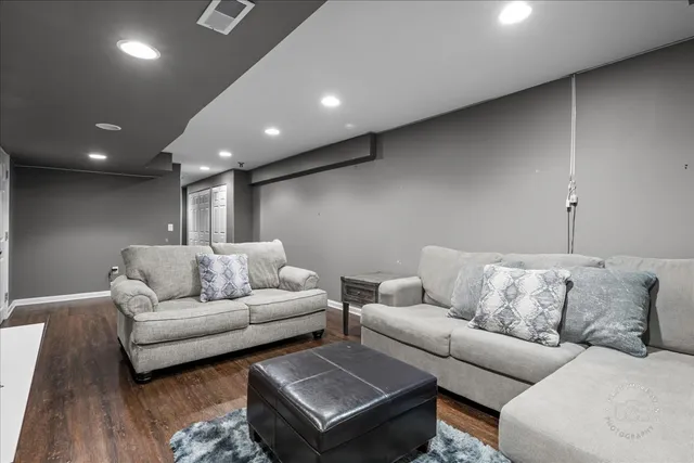 a living room with furniture and a couch