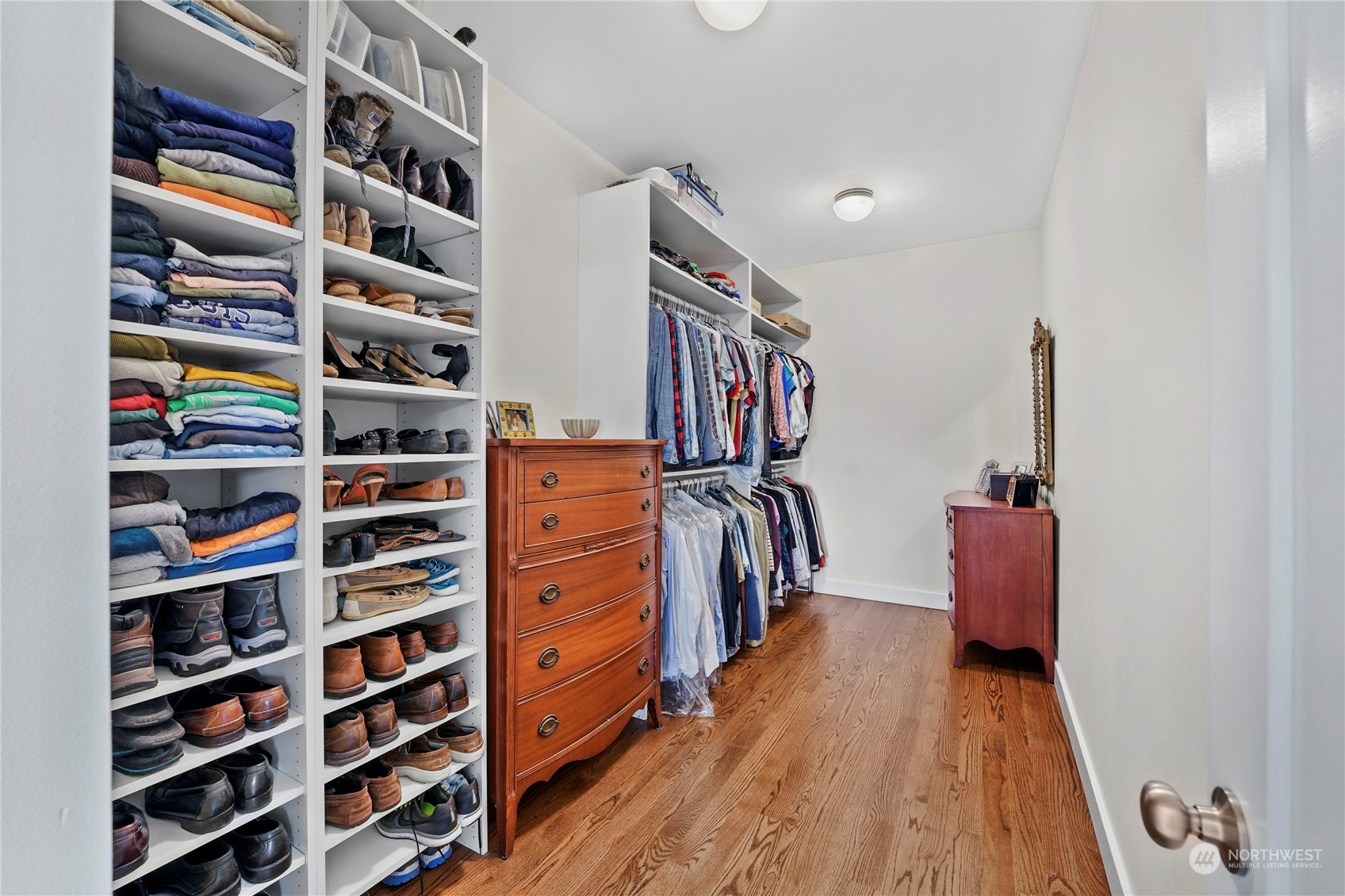 1505 9th Street Anacortes, WA 98221 - Photo 19 of 40 a view of walk in closet with clothes and shoes