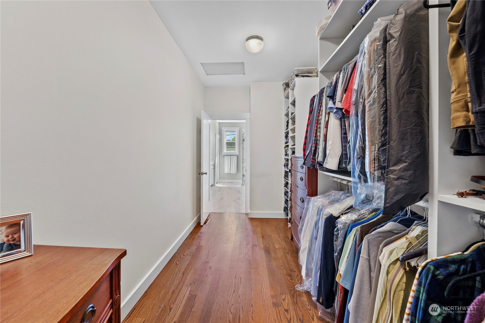 1505 9th Street Anacortes, WA 98221 - Photo 20 of 40 a view of walk in closet with clothes and shoes