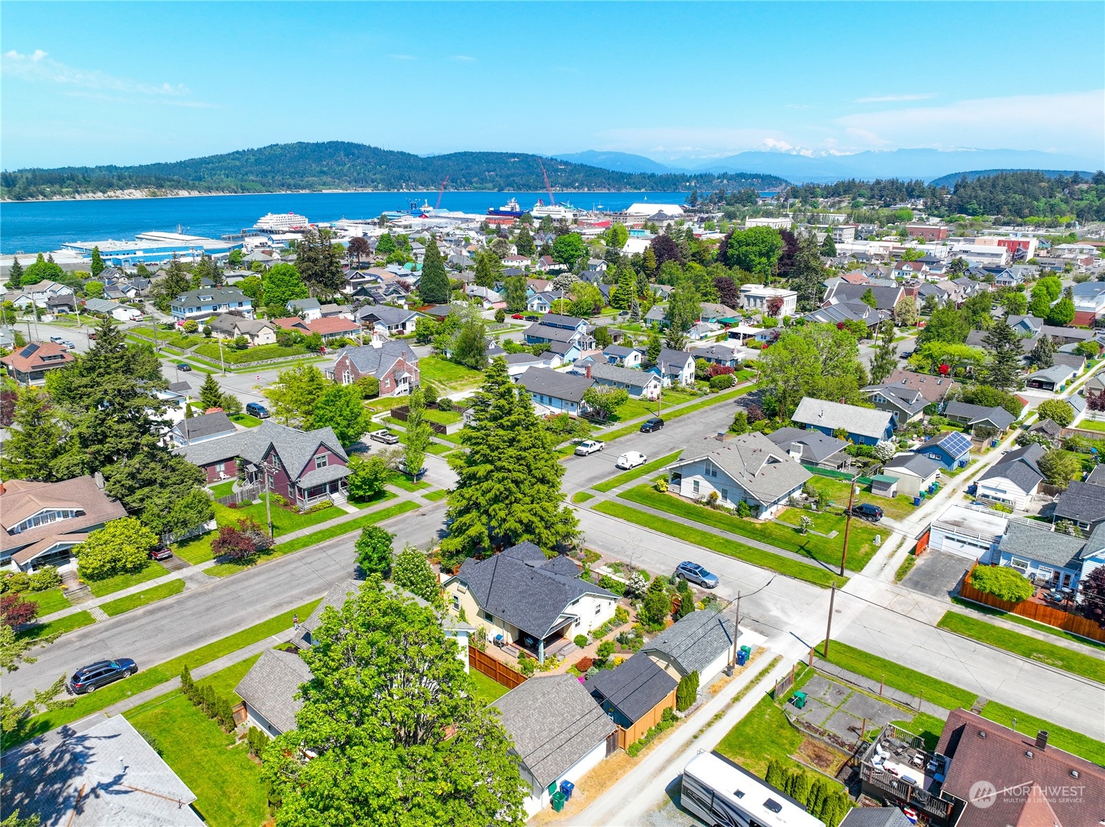 1505 9th Street Anacortes, WA 98221 - Photo 2 of 40 an aerial view of residential houses with outdoor space