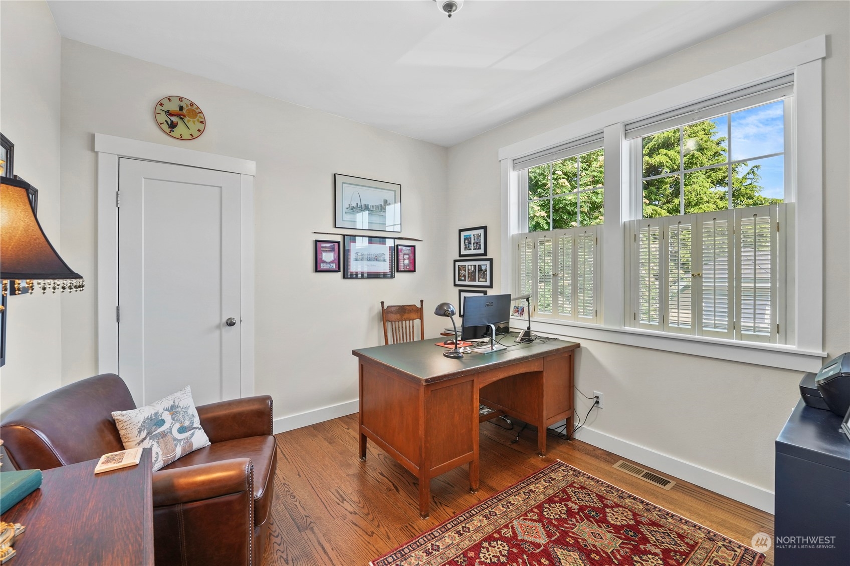 1505 9th Street Anacortes, WA 98221 - Photo 21 of 40 a work room with furniture and a window