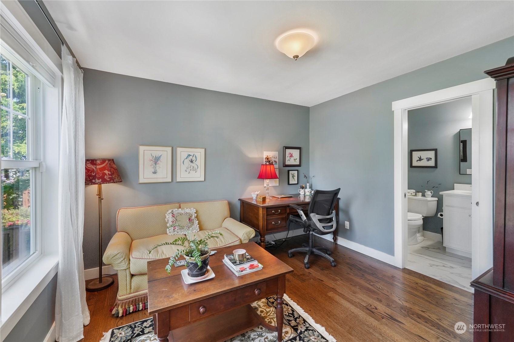1505 9th Street Anacortes, WA 98221 - Photo 22 of 40 a living room with furniture and a wooden floor