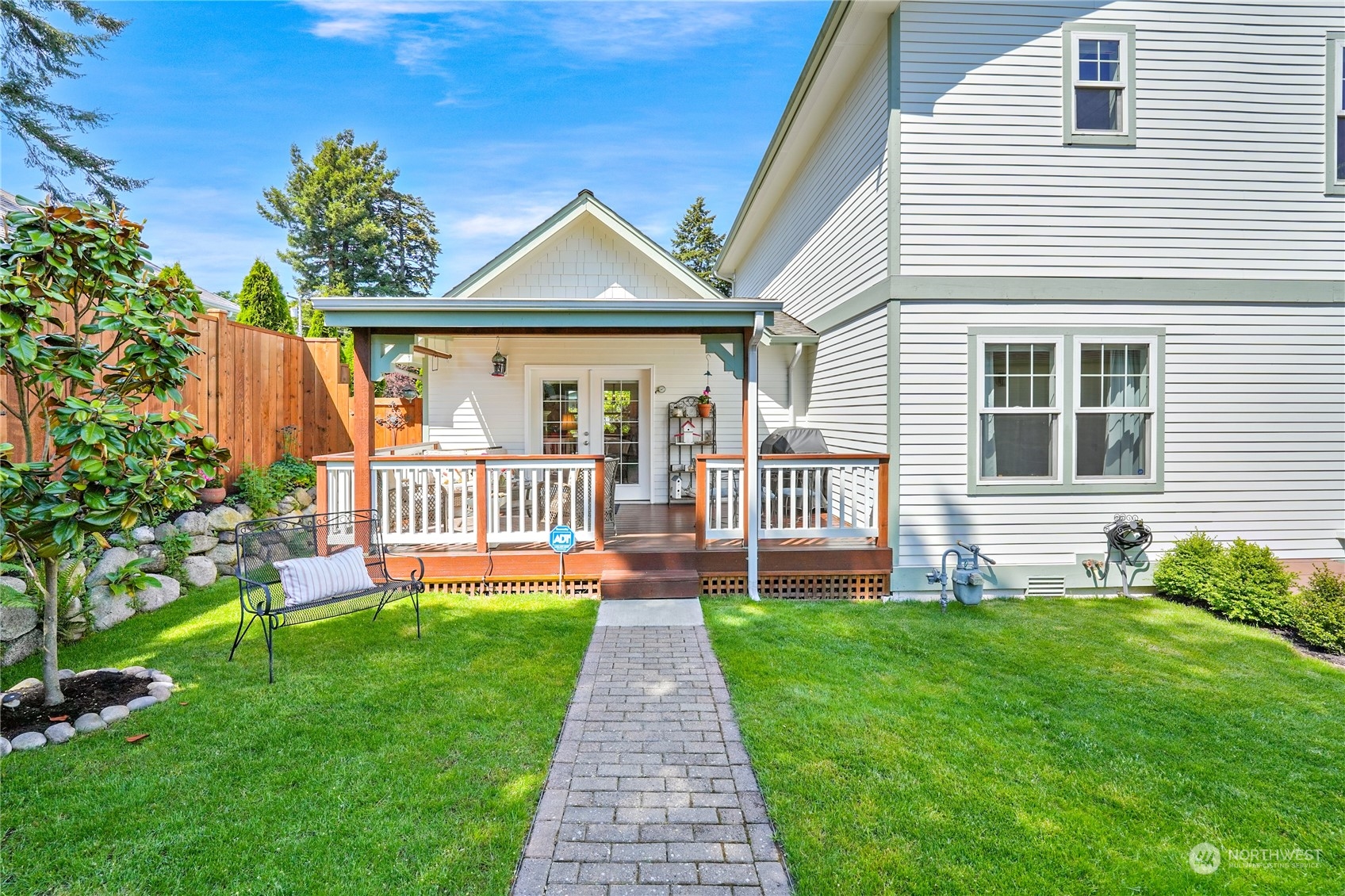 1505 9th Street Anacortes, WA 98221 - Photo 29 of 40 a front view of a house with a yard and porch
