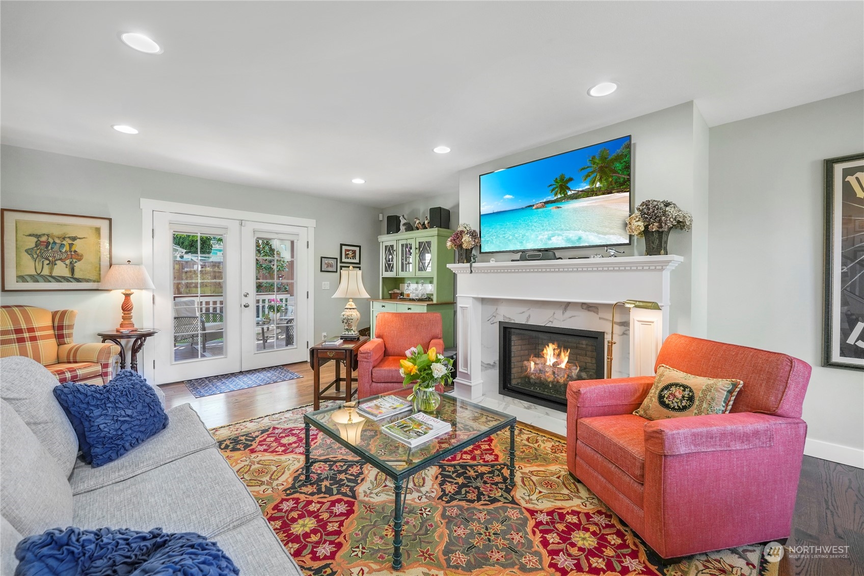1505 9th Street Anacortes, WA 98221 - Photo 5 of 40 a living room with furniture fireplace and window