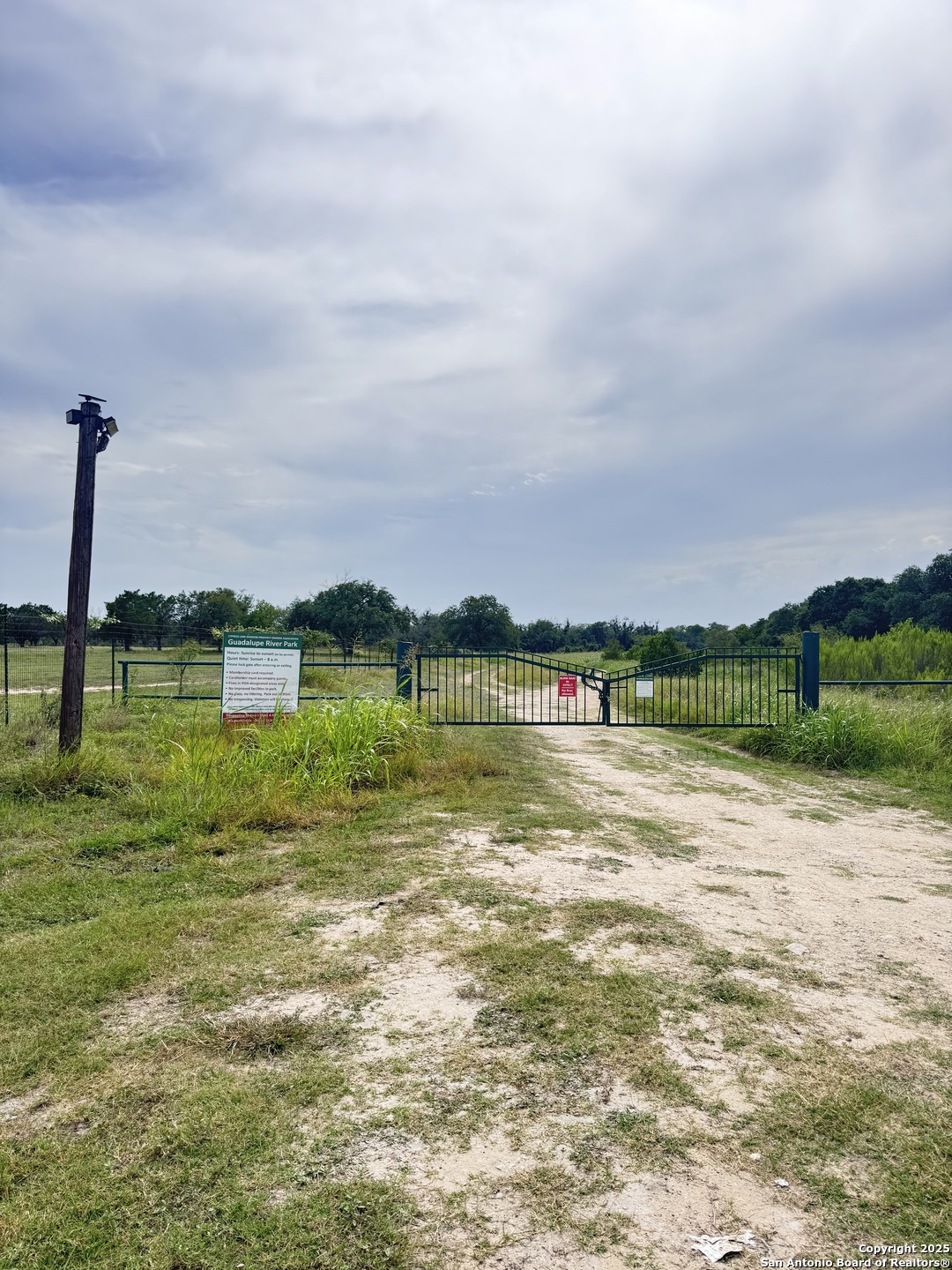 268 Recreation Spring Branch Spring Branch, TX 78070 - Photo 13 of 13 a view of a lake with houses in the background