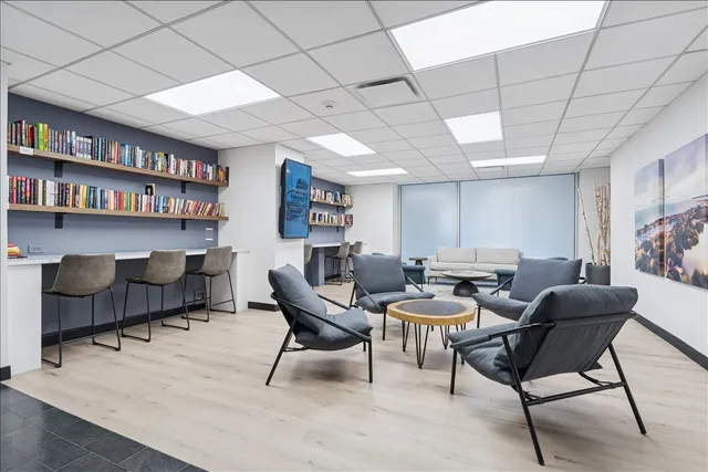 a view of a livingroom with furniture