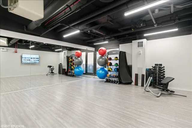 a view of a room with gym equipment