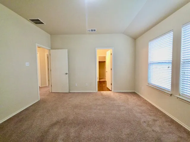 an empty room with windows