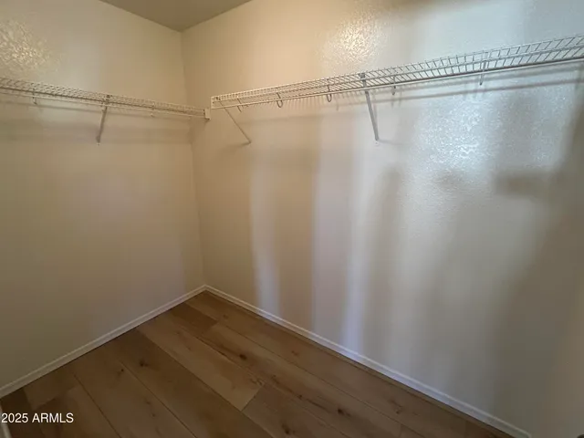 a view of a room with racks on the wall