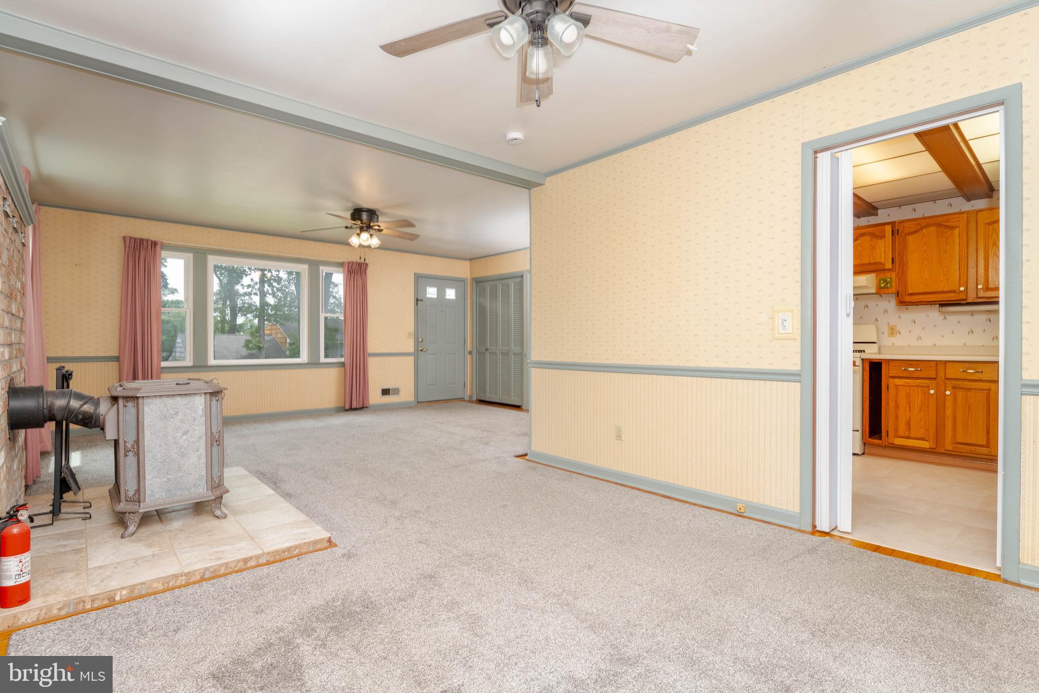 1823 Dunwoody Road Baltimore, MD 21234 - Photo 13 of 32 LIVING ROOM INTO DINING AREA