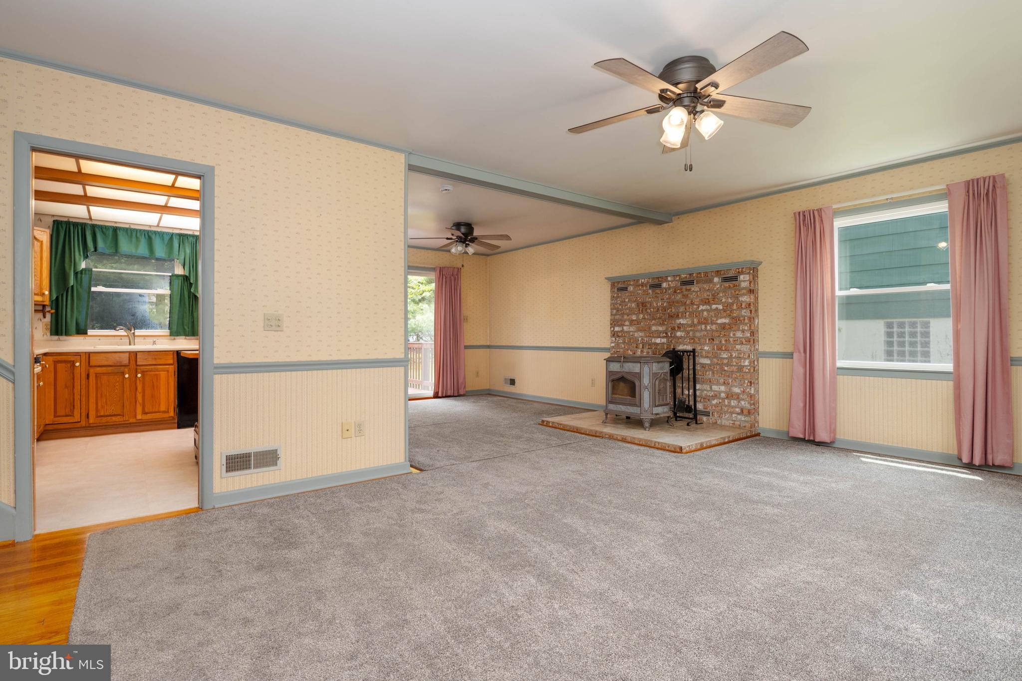 1823 Dunwoody Road Baltimore, MD 21234 - Photo 14 of 32 HARDWOOD UNDER ALL THE AREA RUGS