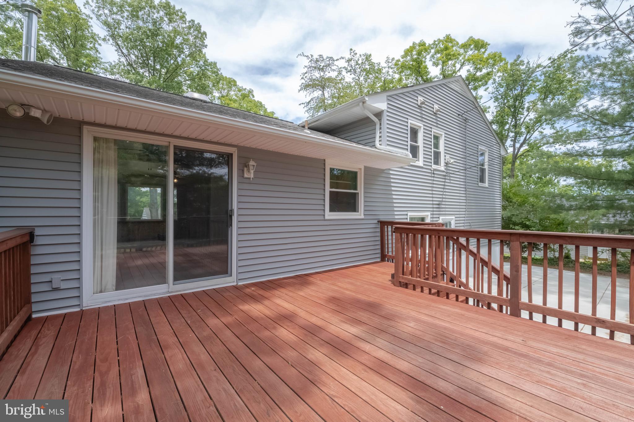 1823 Dunwoody Road Baltimore, MD 21234 - Photo 7 of 32 STAIRS FROM DECK TO PATIO & YARD