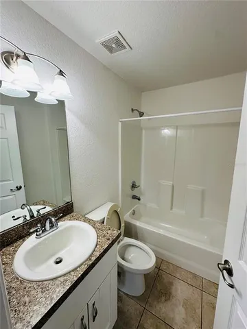 a front view of house with yard