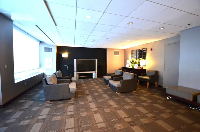 a view of a yard with brick walls