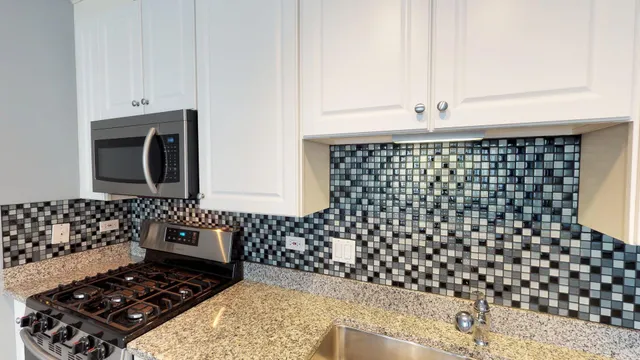 a bathroom with a bathtub and shower