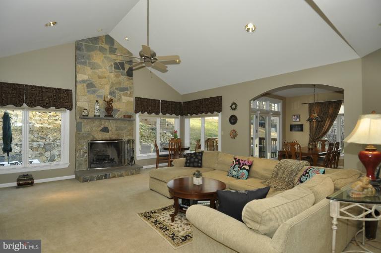 6312 Walhonding Road Bethesda, MD 20816 - Photo 11 of 29 Family Room with rustic fireplace