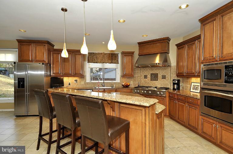 6312 Walhonding Road Bethesda, MD 20816 - Photo 16 of 29 Kitchen breakfast bar