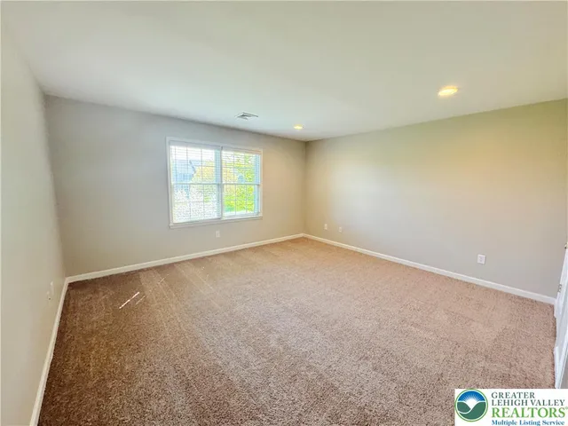 a bathroom with a sink a mirror and a bathtub