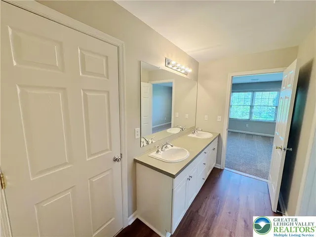 a bathroom with a toilet and a bathtub