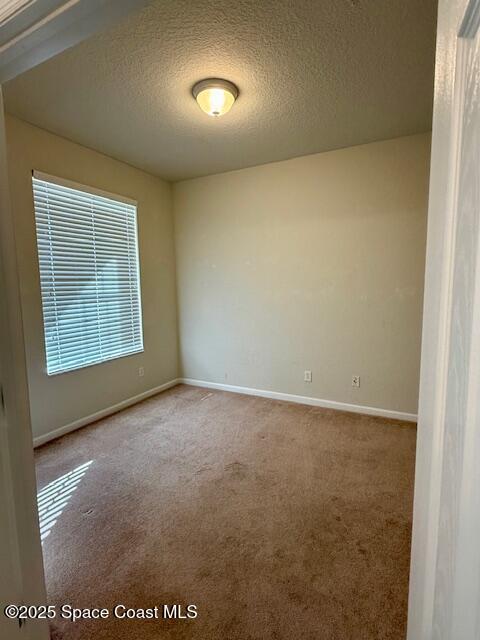 3868 Lexmark Lane, Unit 309 Rockledge, FL 32955 - Photo 12 of 39 an empty room with a window