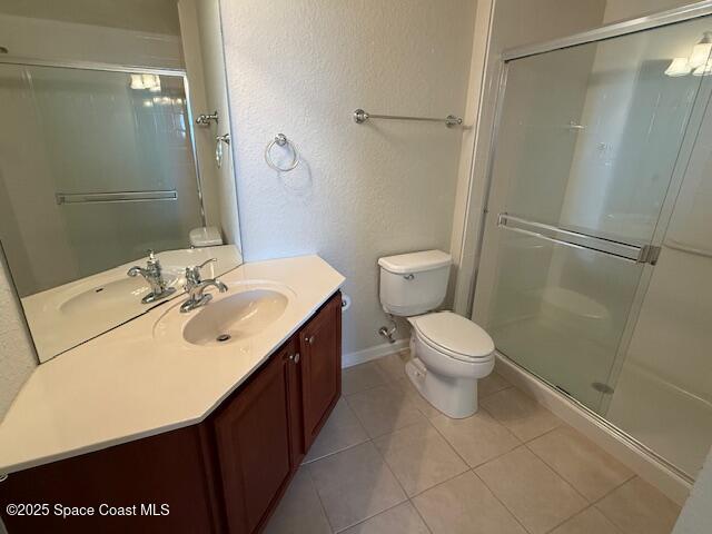 3868 Lexmark Lane, Unit 309 Rockledge, FL 32955 - Photo 16 of 39 a bathroom with a sink toilet and shower