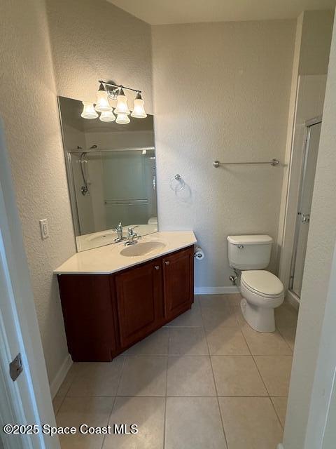 3868 Lexmark Lane, Unit 309 Rockledge, FL 32955 - Photo 17 of 39 a bathroom with a toilet a sink and mirror
