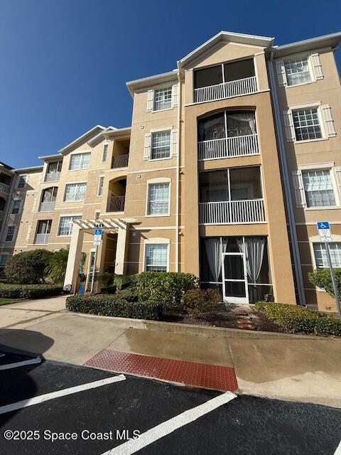 3868 Lexmark Lane, Unit 309 Rockledge, FL 32955 - Photo 31 of 40 a front view of a building