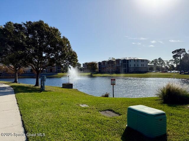 3868 Lexmark Lane, Unit 309 Rockledge, FL 32955 - Photo 5 of 39 a view of a swimming pool with a garden and plants