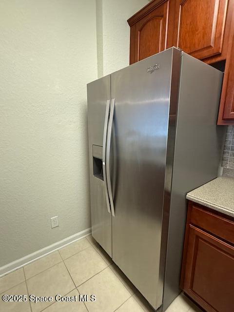 3868 Lexmark Lane, Unit 309 Rockledge, FL 32955 - Photo 8 of 39 a view of a refrigerator in kitchen